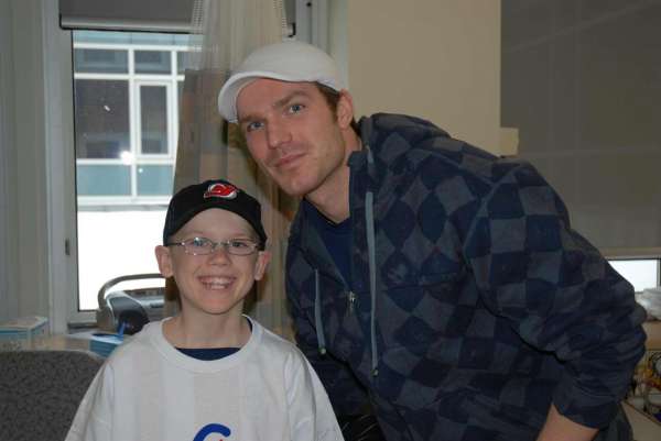 A photo of David Clarkson with one of our patients.