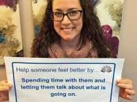 Christina's sign says: Help someone feel better by spending time with them and letting them talk about what is going on.thumbnail image.