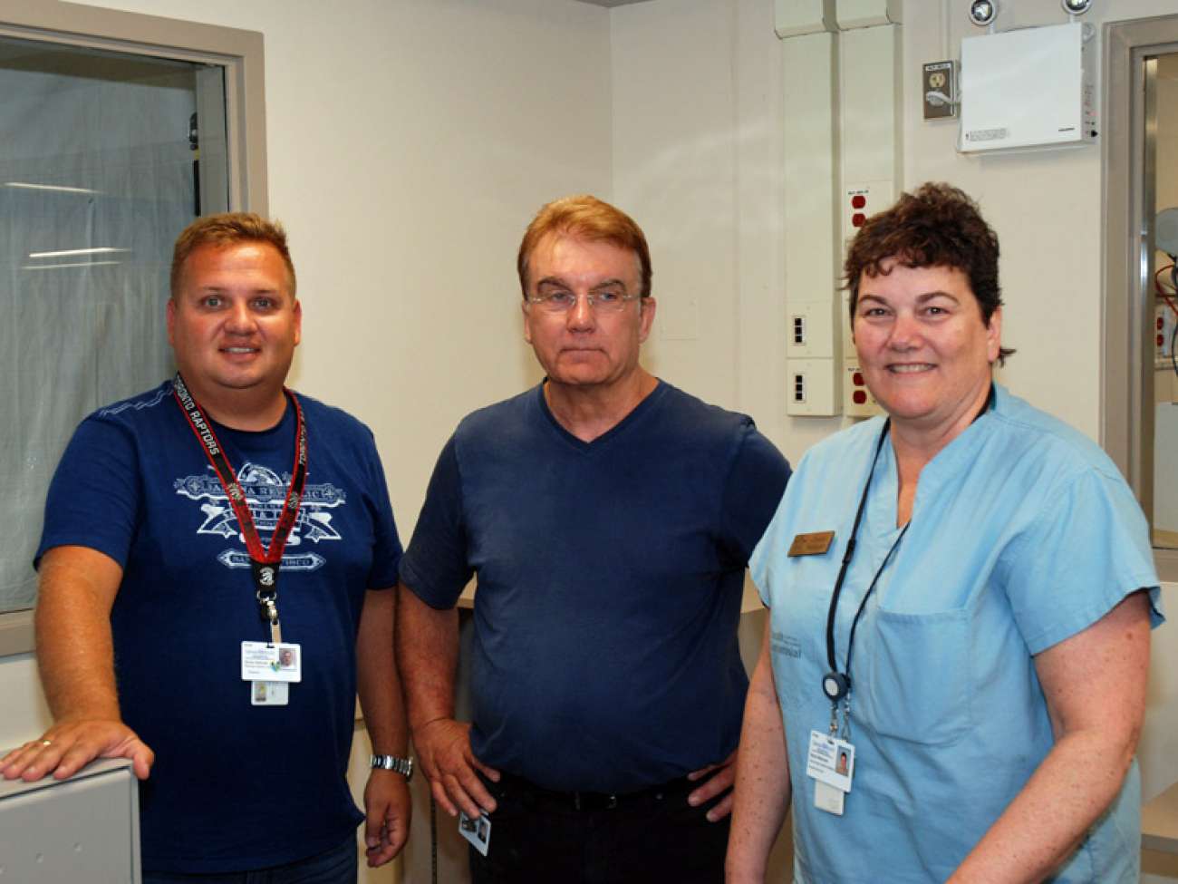 Some staff completing the finishing touches on the project include Goran Petrovic from pharmacy, Larry Craig from facilities and Sigrid Matchett from surgery