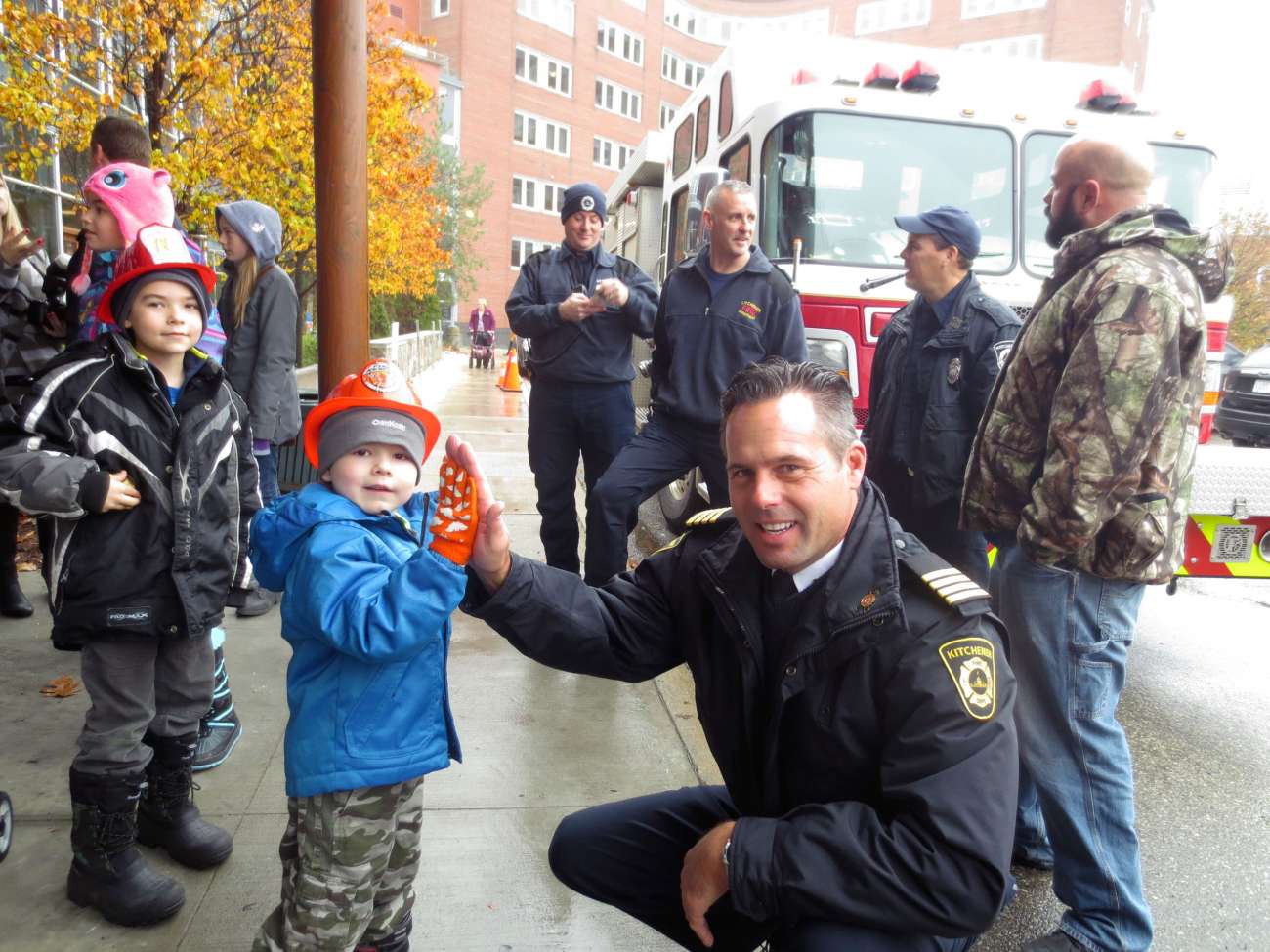 Evan gets a high-five from Deputy Fire Chief Bob Gilmore