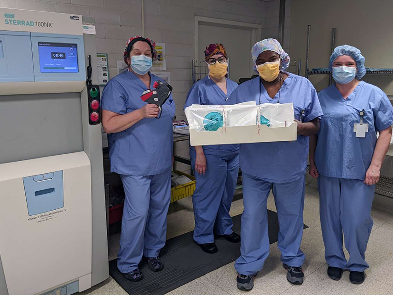 Kelly, Tabitha, Sharon, and Cindy are a few of the many MDRD technicians reprocessing masks at GRH.