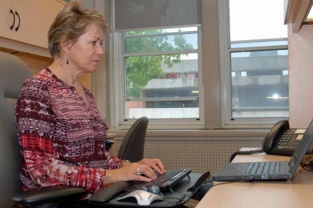 Melissa Dennison At Computer
