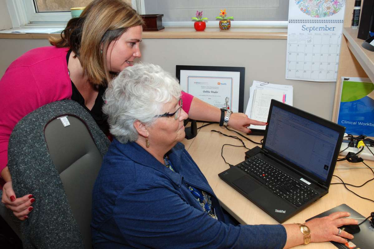 Debbie Bruder and Belinda Buchenauer review upcoming changes to clinical documentation.