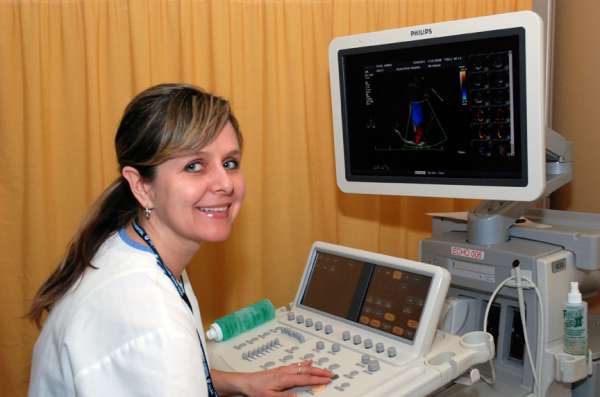 A photo a technician conducting an echocardiogram