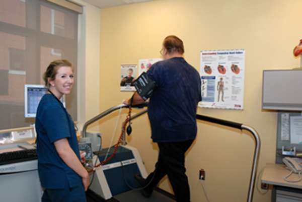 A care provider and patient during a stress test