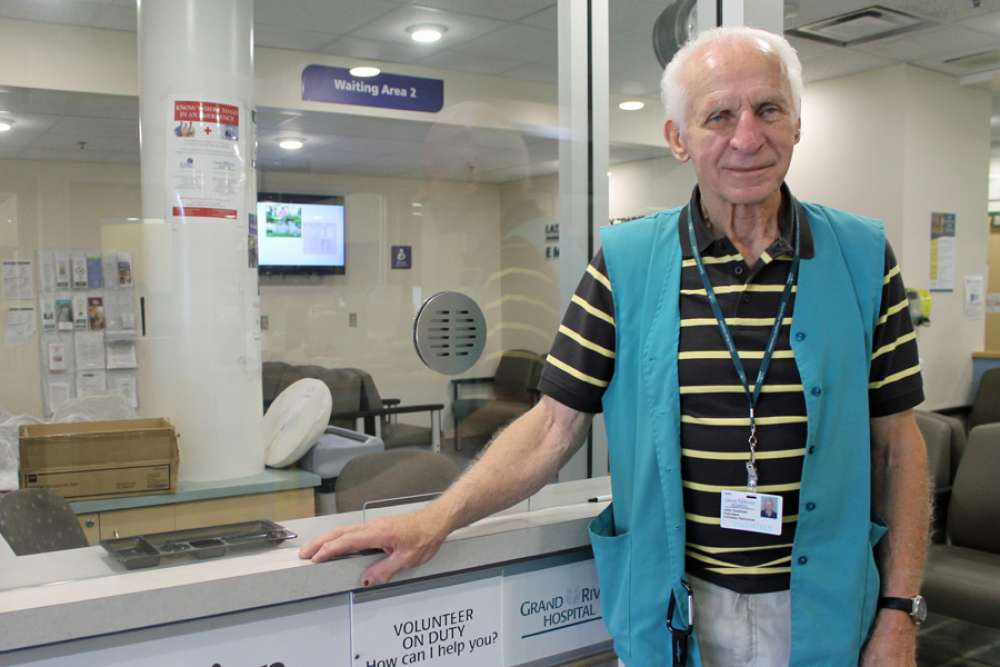 John Goertzen At The Volunteer Desk