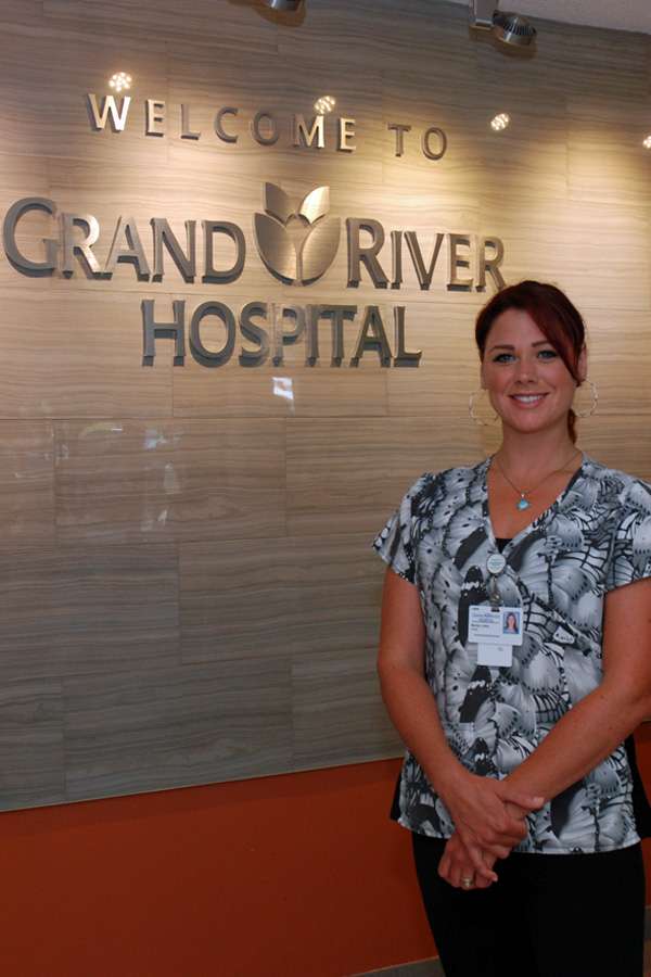 Becky Linka standing in the KW Campus main lobby