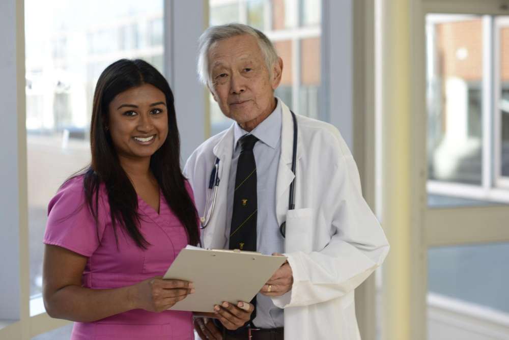 A photo of two renal care providers