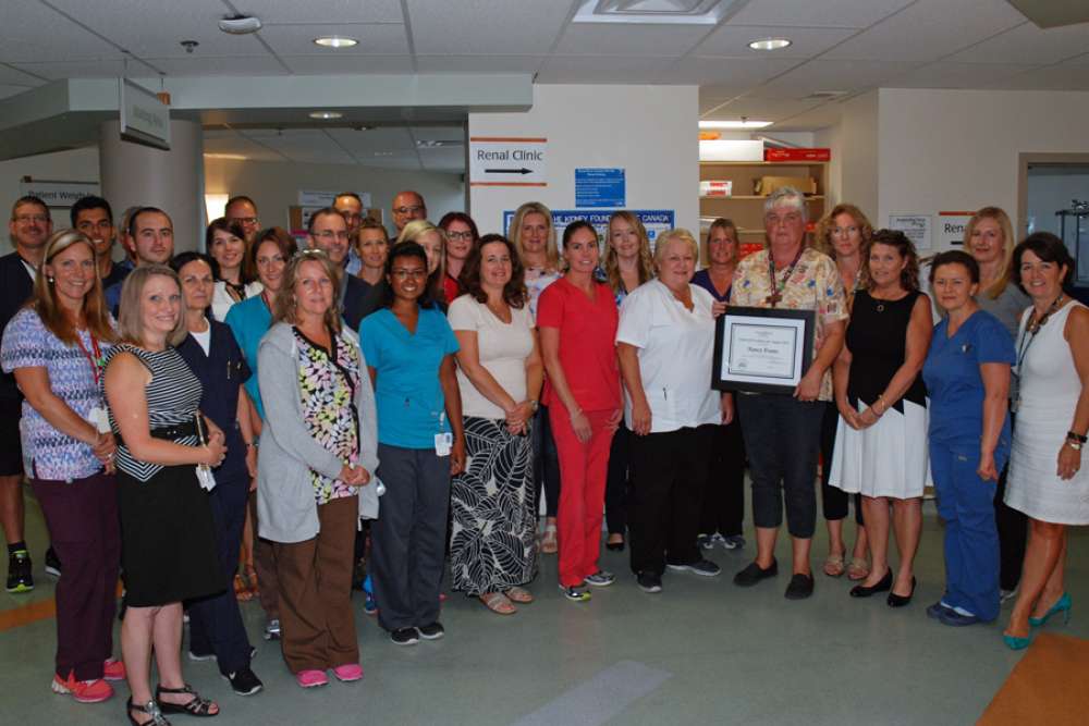 Nancy Evans from GRH's regional renal program stands with her regional renal program team-mates