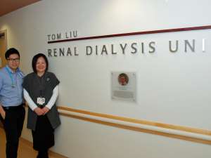 Nephrologist Dr Michael Wang stands next to nurse practitioner Nan Miller.