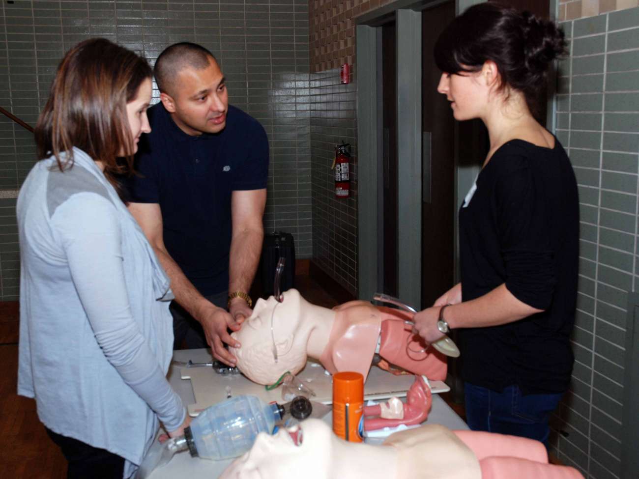 Emergency care providers in a practice session for advanced trauma life support