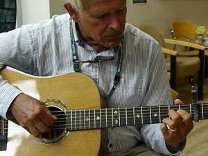 Doug Jones Playing Guitar