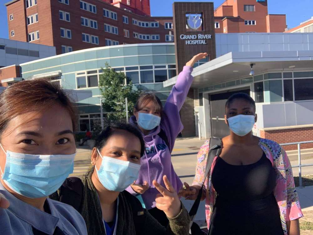 4 student nurses in front of Grand River Hospital KW campus