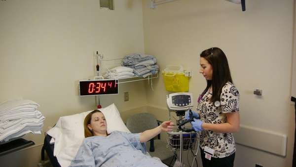 A nurse caring for a stroke patient
