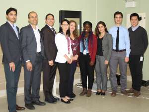 The KA Imaging and Grand River Hospital study team come together in front of the imager