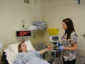 A nurse caring for a stroke patient