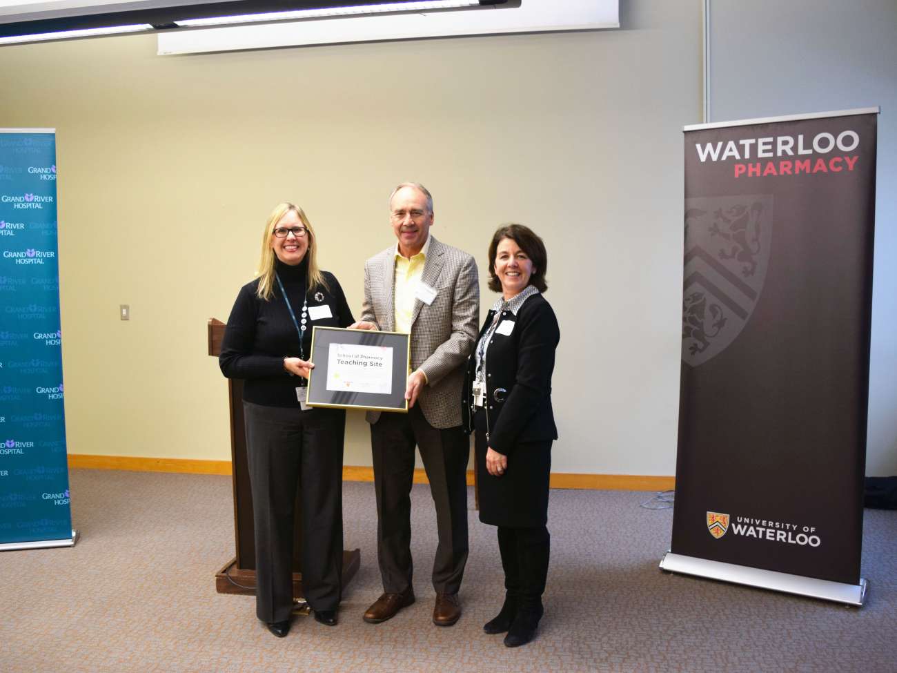 GRH's Jane Martin and Judy Linton (left, right) accept a plaque from Dr. David Edwards (University of Waterloo, middle).