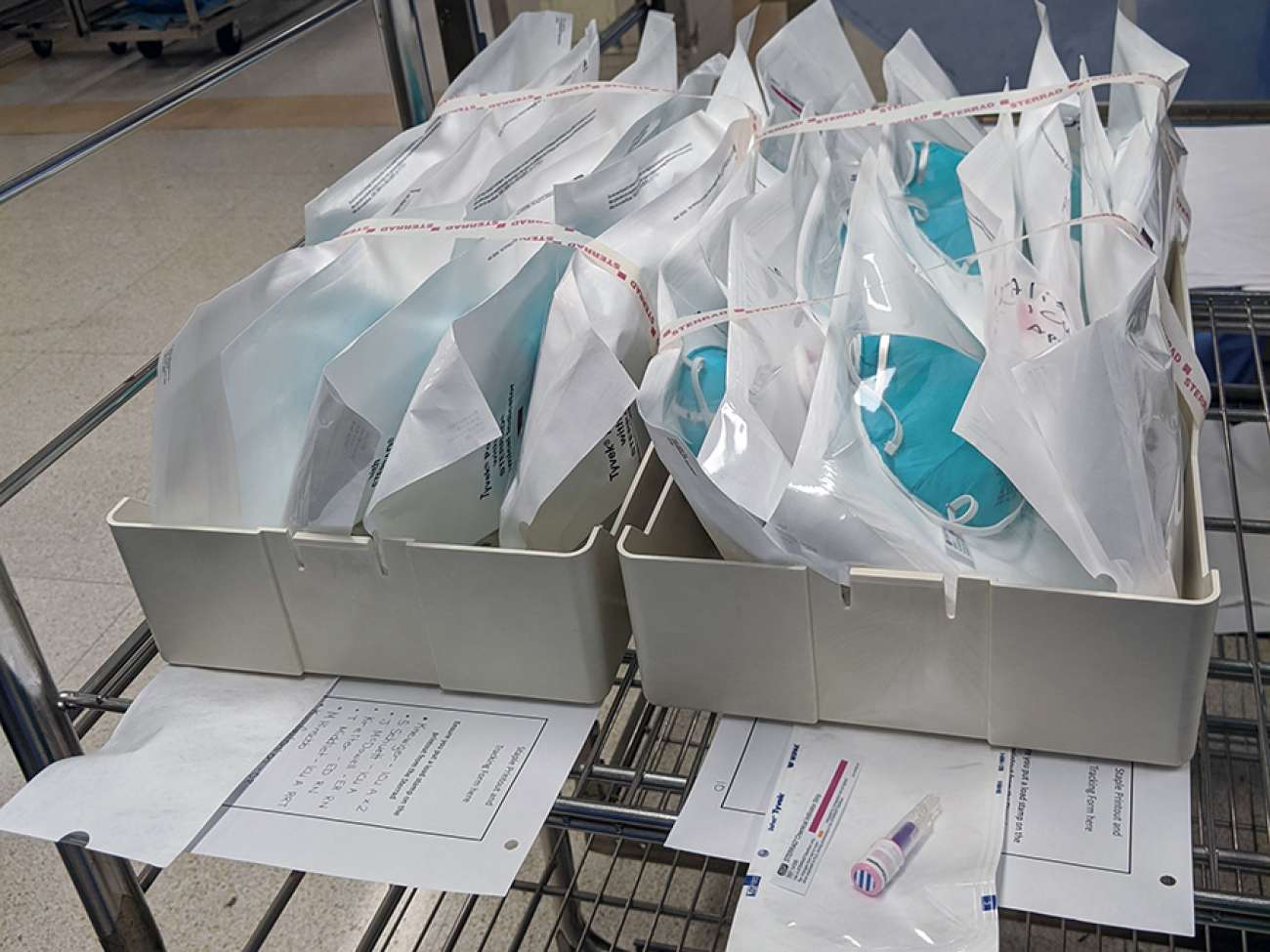 Masks are placed together in groups of 10, ready to be reprocessed