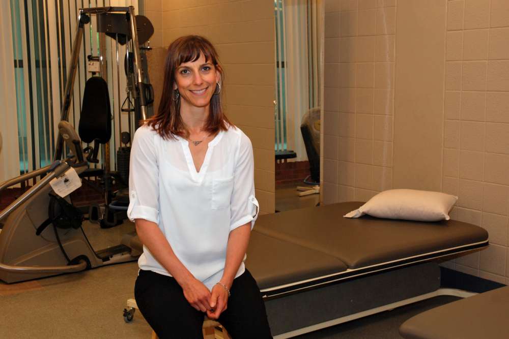 GRH occupational therapist Sherry Rock sits in a therapy room.