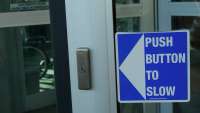 A button to slow a revolving door